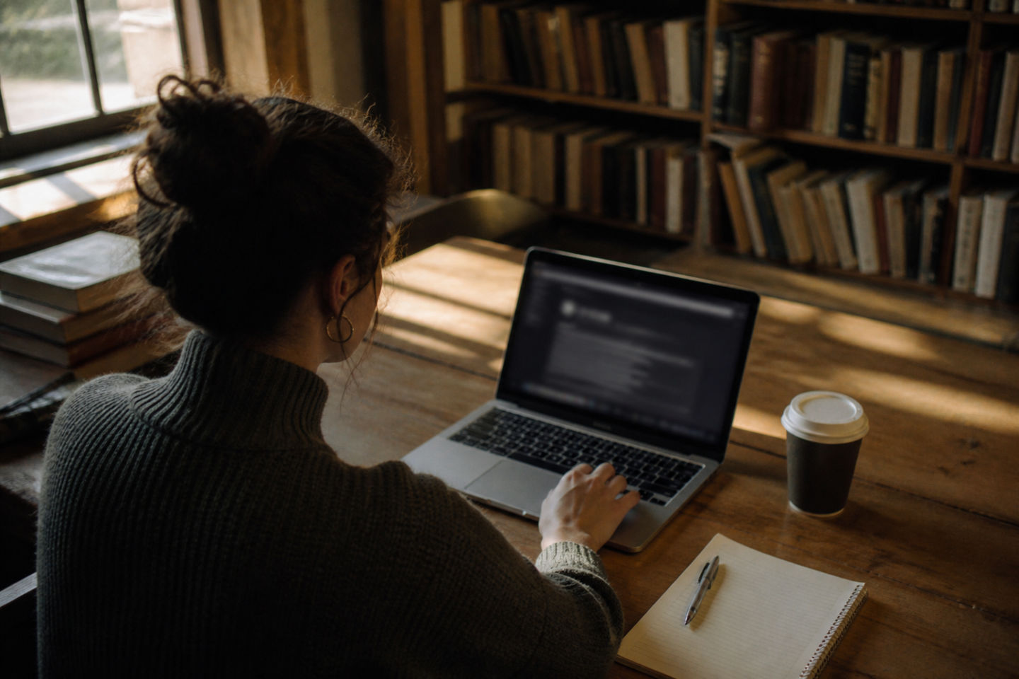 individual studying hidden resources in library